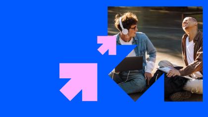 Young people using a laptop, headphones and laughing while sitting down, surrounded by a Future Reset branded frame