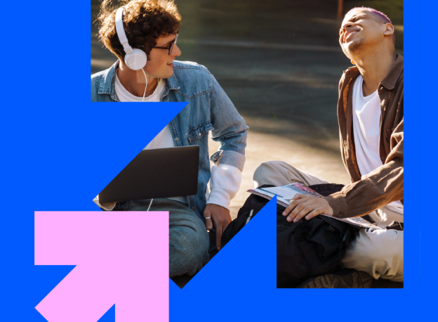 Young people using a laptop, headphones and laughing while sitting down, surrounded by a Future Reset branded frame